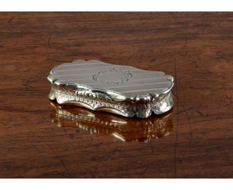 A Victorian silver vinaigrette, Nathaniel Mills, Birmingham, 1852, of rectangular scalloped edged form with diagonal engine t