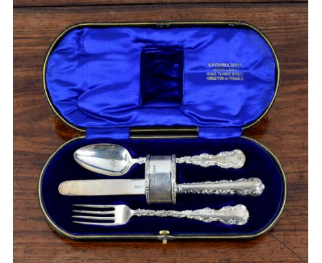 A George V silver four piece christening set, Lee & Wigfull, Sheffield, 1911, comprising of spoon, knife, fork (different dat