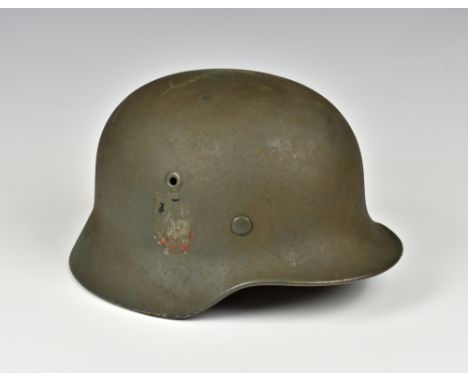 A believed Lt Müller German WWII M42 helmet - Channel Islands Occupation interest, with covered up/scratched off double decal