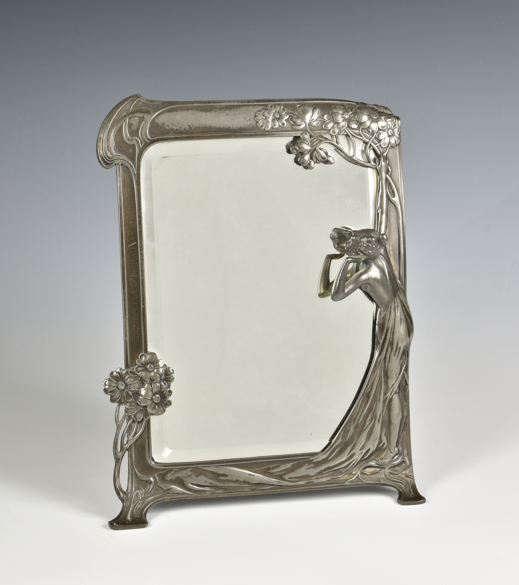 A WMF Art Nouveau pewter dressing table mirror, early 20th century, the