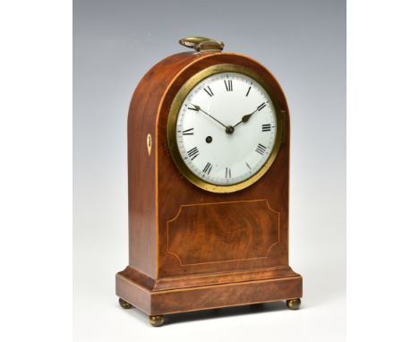 An early 19th century mahogany arched mantel clock by Richard Ganthony of London, with single train fusee movement, the arche