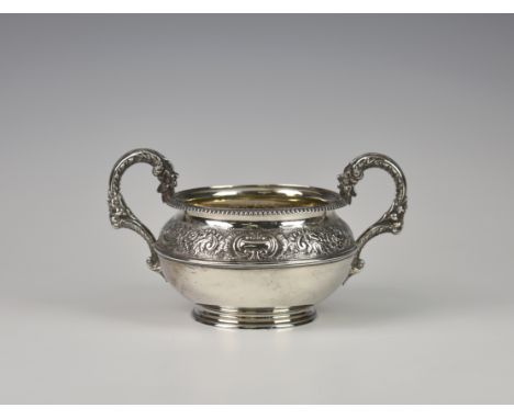 A George IV silver sucrier, Benjamin Smith II, London 1820, of typical cylindrical form, twin floral embossed handles, gadroo