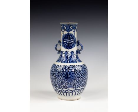 A Chinese porcelain blue and white twin handled vase, in the Kangxi style, probably 19th Century, of bottle form with slightl