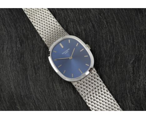 A Patek Philippe 18ct white gold Ellipse gents bracelet wrist watch, c.1972, Ref. 3748/1, Movement No. 1156338, with blue sun