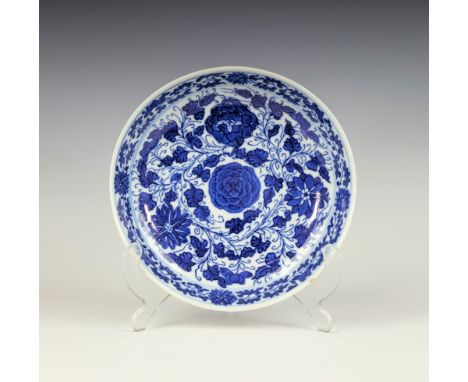 A Chinese blue and white porcelain saucer dish, Kangxi period (1662-1722), with single character mark to base reading 'Jade' 