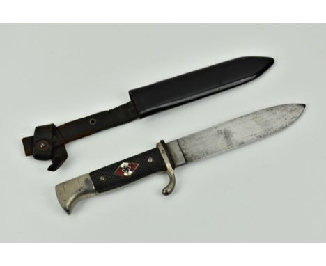 An original Hitler Youth knife and scabbard, the bakelite grip plates closely checkered, with HJ insignia to centre, the blad