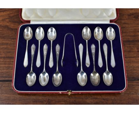 A cased set of Scottish silver teaspoons and sugar tongs, Hamilton & Inches, Edinburgh, 1934, the twelve teaspoons and pair o