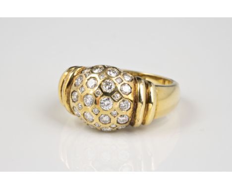 An 18ct yellow gold and diamond bombe ring, pavé set with brilliant cut diamonds, within double ring shoulders, ring size M½.