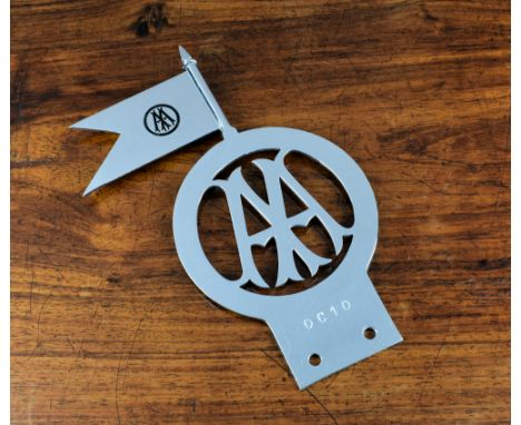 A scarce AA committee members car badge, c.1945-57, surmounted by black enamelled pendent, the badge numbered OC10, 8½in. (21
