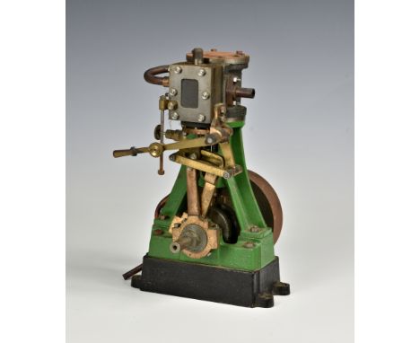 A well engineered stationary vertical single cylinder live steam engine, single solid flywheel to side, painted in green, 10i
