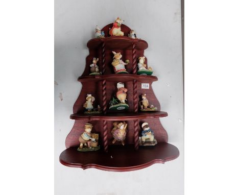 A collection of Foxwood tales figures from Picnic at Foxwood collection with display stand (13) (all boxed with certs)