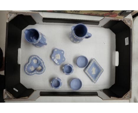 A collection of Wedgwood jasperware items to include jugs, trinket boxes, small vases etc 