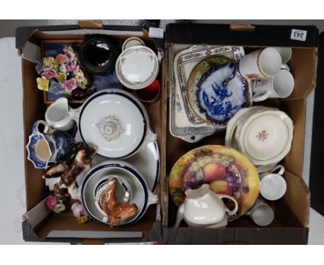 A mixed collection of items to include blue and white dinnerware, ceramic dogs, commemorative mugs etc (2 trays) 
