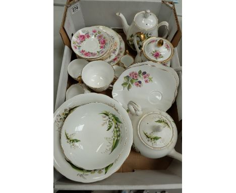 A mixed collection of teaware to include Melba snow drop pattern items, Queen Anne serenade items including teapots, cup, sau