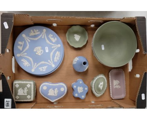 A collection of Wedgwood jasperware items to include large sage green bowl, trinket boxes, blue jasperware plates, trinket bo