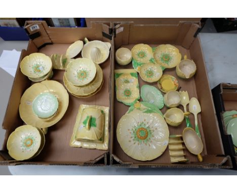 A good collection of Carltonware art deco teaware in the The Australian pattern to include toast stands, butter dishes, lemon