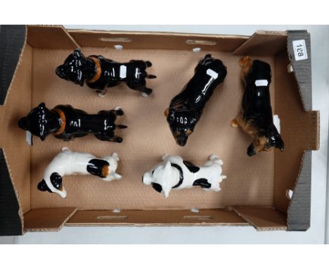 A collection of unmarked ceramic figures of dogs (6)