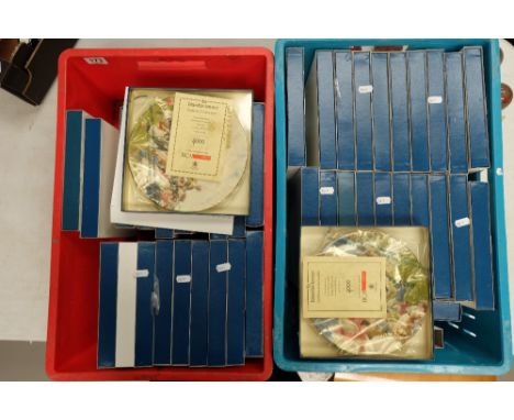 A large collection of Royal Worcester boxed decorative plates of Wimbledon and the Oxford boat race (2 trays)