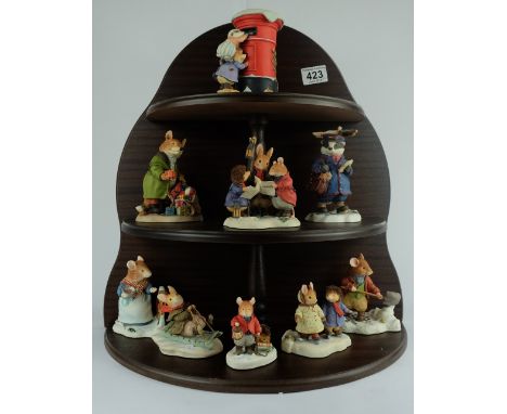 A collection of Foxwood tales figures from The Winter at Foxwood collection with display stand (10) (all boxed with certs)