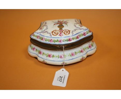 A SEVRES / LIMOGES STYLE CERAMIC TRINKET, of bombe form, white ground with floral embellishment, hinged lid and metal mounts,
