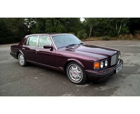 January 1997 Model Year Bentley Brooklands Light Pressure Turbo finished in Wildberry with Parchment Twin Thin Fine Lines.  O