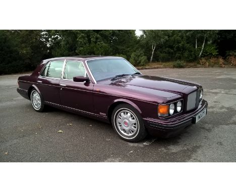 January 1997 Model Year Bentley Brooklands Light Pressure Turbo finished in Wildberry with Parchment Twin Thin Fine Lines.  O