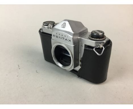 PENTAX ASAHI CAMERA, in leather case, along with a Brownie, vintage money bank, slide rules, glass ware and other items