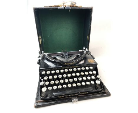 IMPERIAL GOOD COMPANION TYPEWRITER, in a fitted case, 30.5cm wide