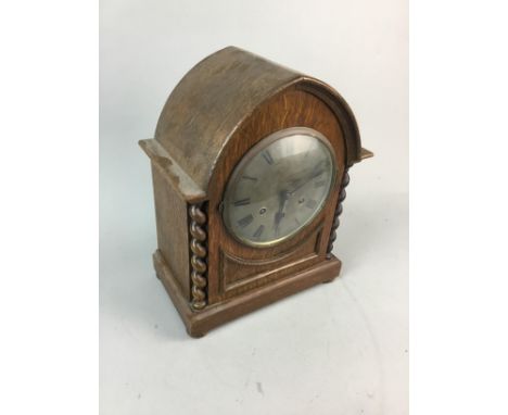 OAK CASED MANTEL CLOCK, 33cm high