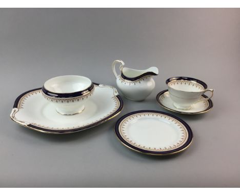 AYNSLEY BLUE &amp; GILT PART TEA SERVICE, along with a Royal Chelsea Golden Rose part tea service