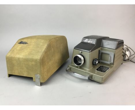 ALDIS COLOUR SLIDE PROJECTOR, along with a Luxor projector screen in box (2)