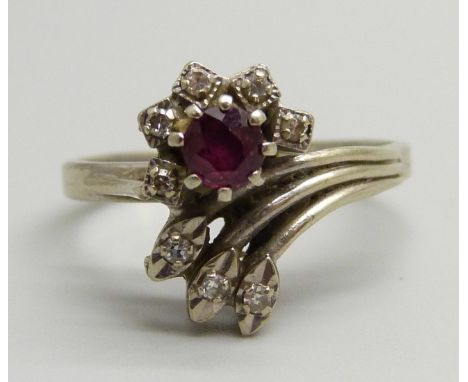 An 18ct gold, ruby and diamond set ring, 3.4g, N 