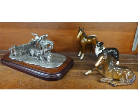 Two Beswick foals, a Beswick sheepdog and a pewter model of steeplechasers 