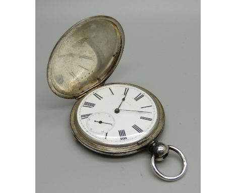 A silver hunter pocket watch, lacking button 