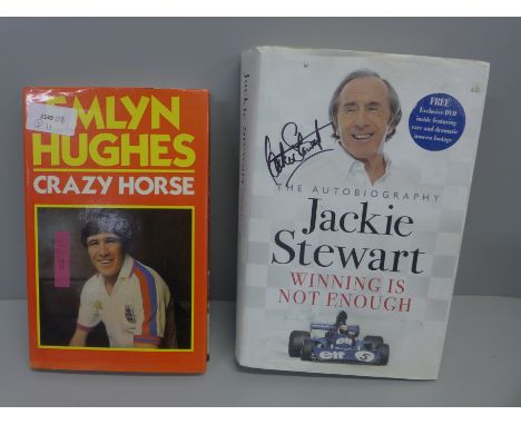A Jackie Stewart signed book and an Emlyn Hughes signed book 