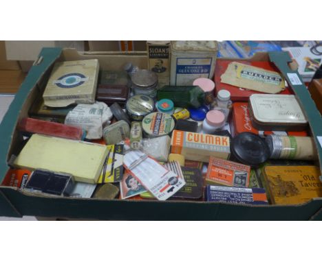 A collection of vintage tins and advertising items 