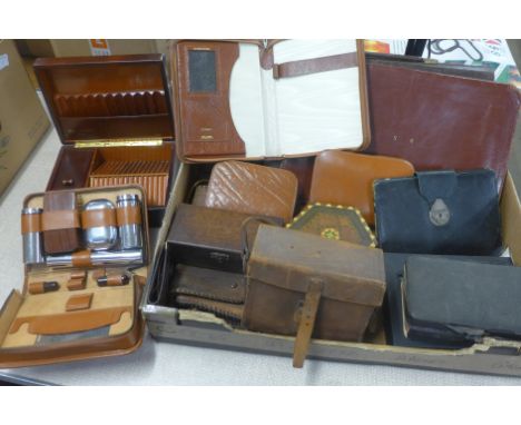 Leather goods and other items, a shaving set, a cigarette box, a leather camera case, etc. 