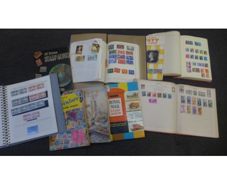 Nine albums of vintage stamps 