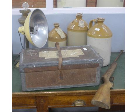 A wooden crate, three stoneware flagons including Tom Massis Worksop and Langton &amp; Sons Melton Mowbray, an air rifle and 