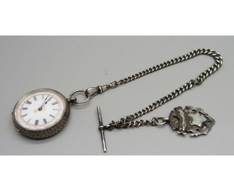 A silver fob watch, chain and fob 