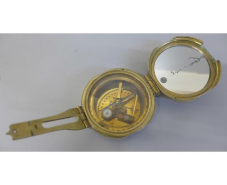 A brass natural sine compass 