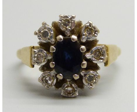 An 18ct gold, diamond and sapphire ring, 5.5g, O 