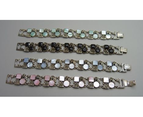 Four similar silver bracelets set with mother of pearl, marcasite 