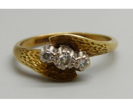 An 18ct gold and diamond set ring, 3.6g, O 