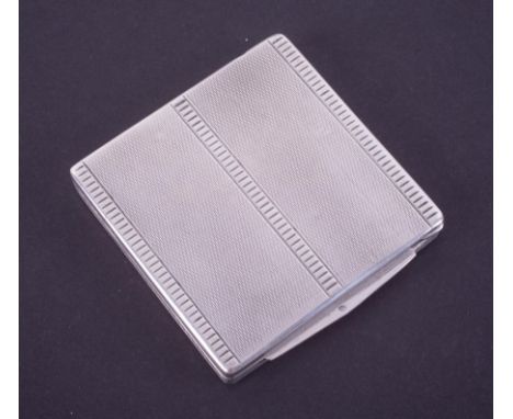 A small silver cigarette case engine turned, approx. 2.260oz.