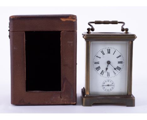 French carriage clock with alarm and platform escapement and travel case.
