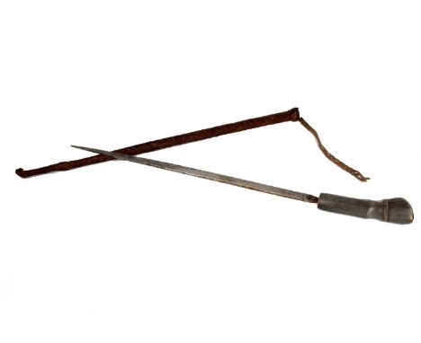 A swagger stick blade with hoof shaped pommel in a brown leather sheath. 