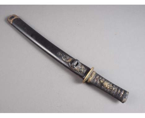 A 19th century Japanese Tanto short sword, blade with engraved dragon on one side and a cherry blossom tree on the other, wit