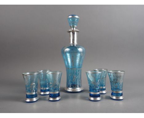 An Italian? blue glass cordial set with silver painted decoration, comprising decanter, stopper and six glassesCondition:No v