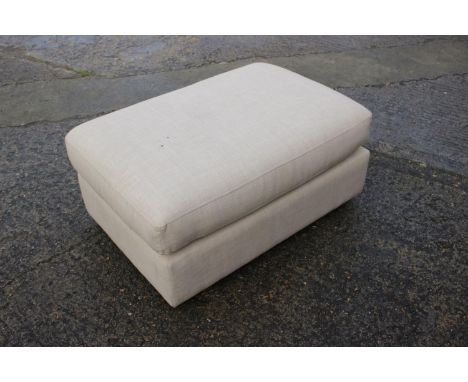A rectangular pouffe/ottoman, upholstered in a linen, 36" wide x 22" deep x 17" high